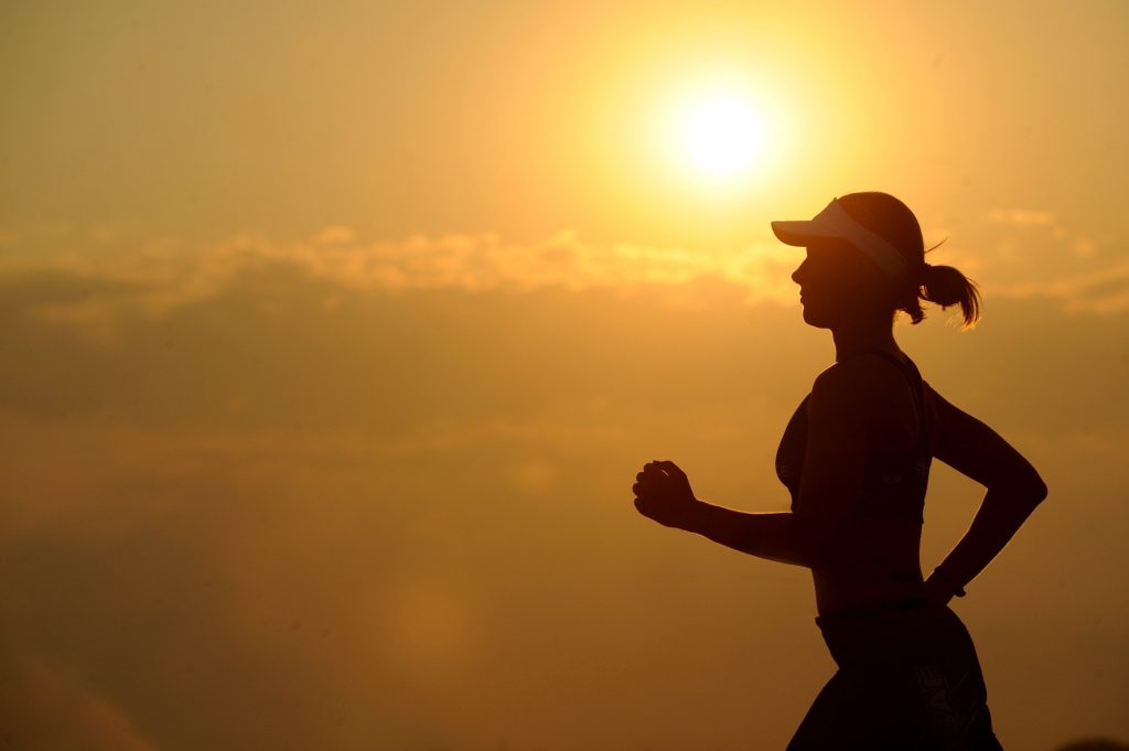 women-jogging-at-sunset